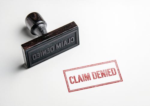 Claim Denied Stamp in Red Ink